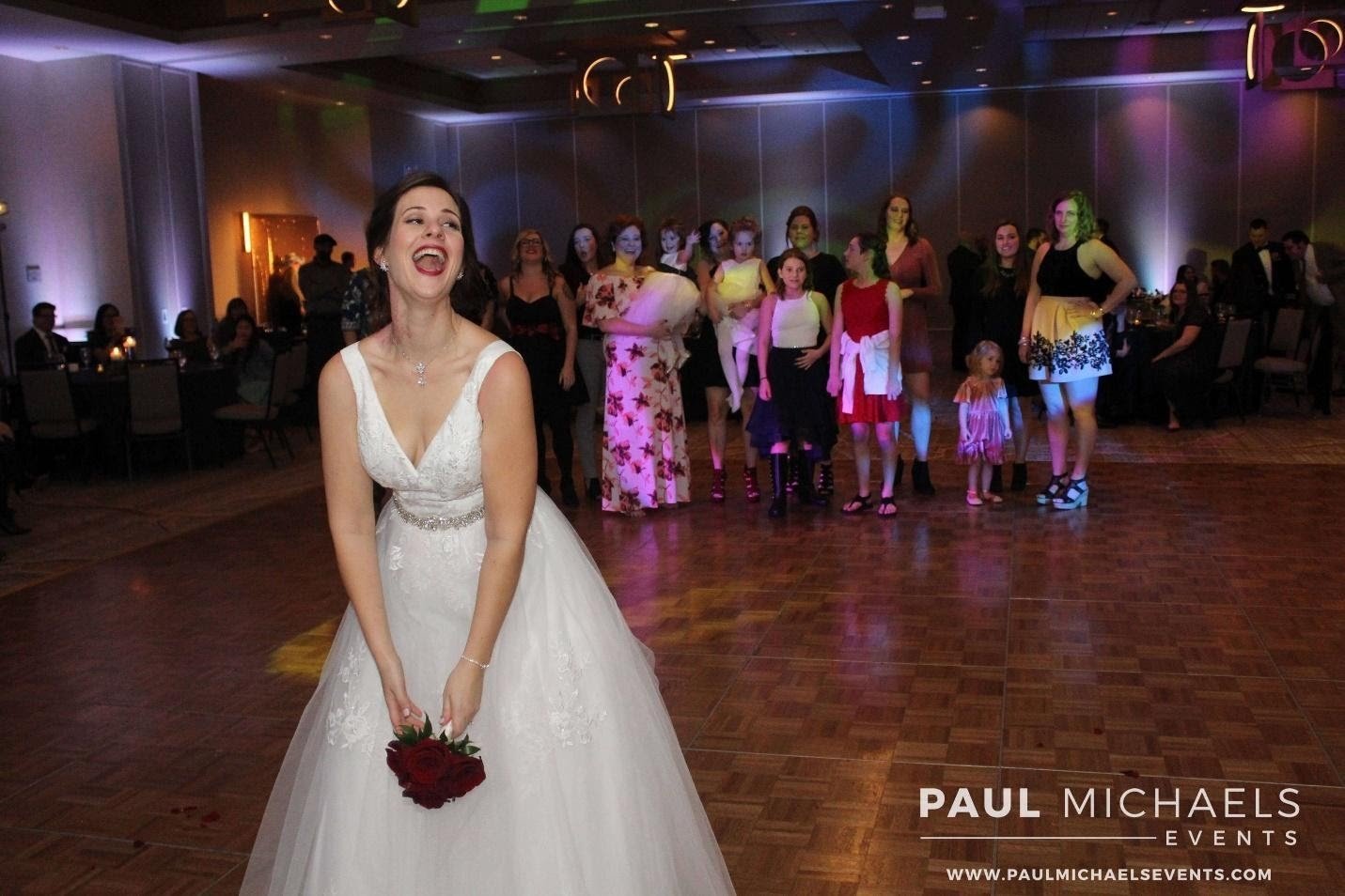 Chicago bride tossing her bouquet