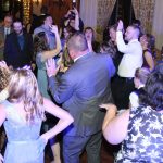 Guests dancing at a wedding reception