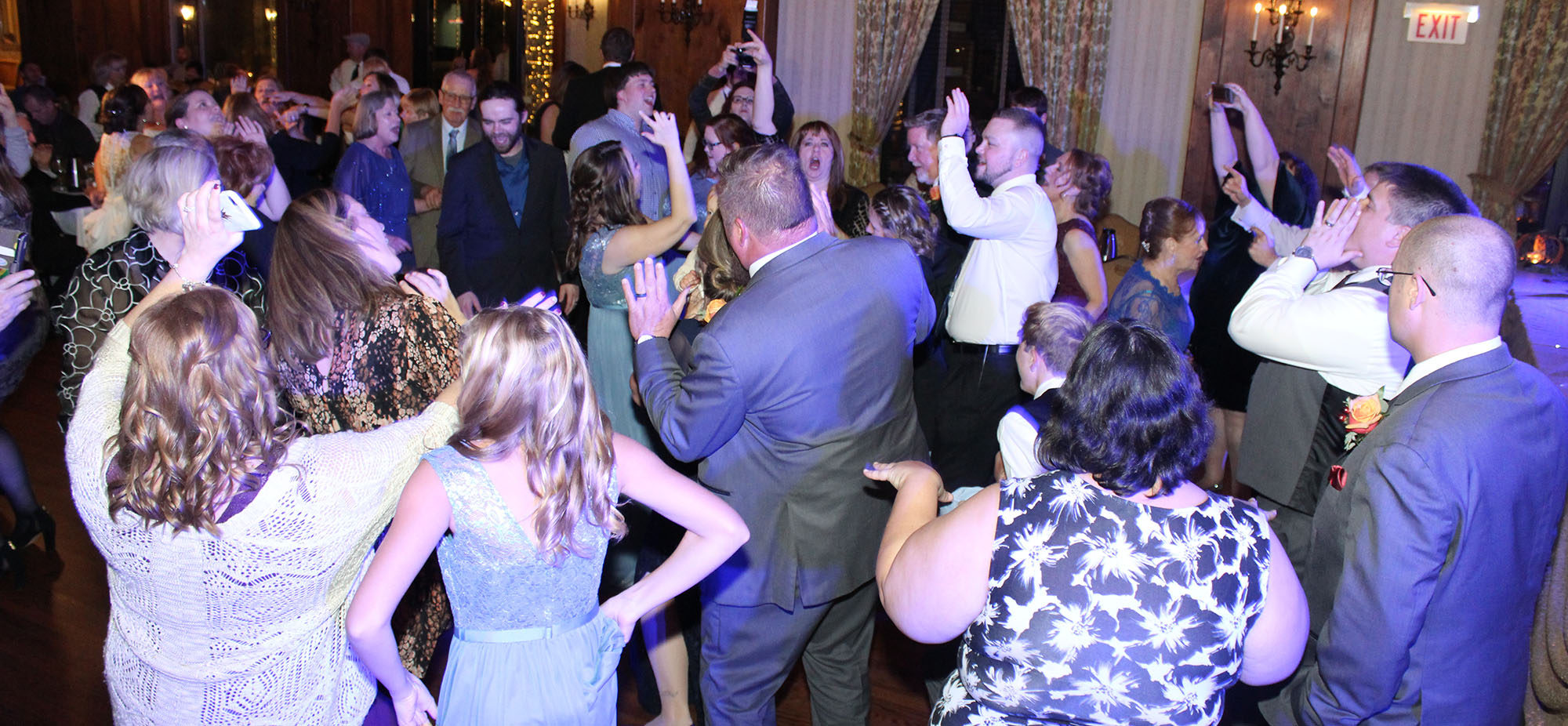 Guests dancing at a wedding reception