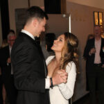 Bride and groom sharing their first dance at their post elopement party at Rhine Hall in Chicago, music and DJ services provided by Paul Michaels Events Company