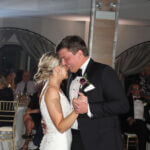 Bride and groom sharing first dance at Elements on Water Street in Naperville, Illinois, with DJ services by Paul Michaels Events, a Chicago suburbs wedding DJ