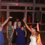 A bride and her guests dancing on the dance floor to the best DJ entertainment services in Chicago, Paul Michaels Events