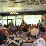 A room full of guests celebrating the life of Bill, with Celebration of Life DJ Services by Paul Michaels Events