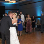 Bride and groom exchanging a kiss,