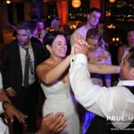 Bride and groom in the middle of the dance floor,